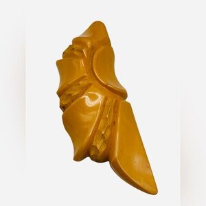 Vintage Deeply Carved Butterscotch Bakelite Dress Clip